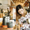 Woman in shop counting