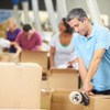 Workers,In,Warehouse,Preparing,Goods,For,Dispatch