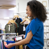 Lady scanning product in store