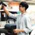 Retail staff scanning in store
