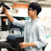 Retail staff scanning in store